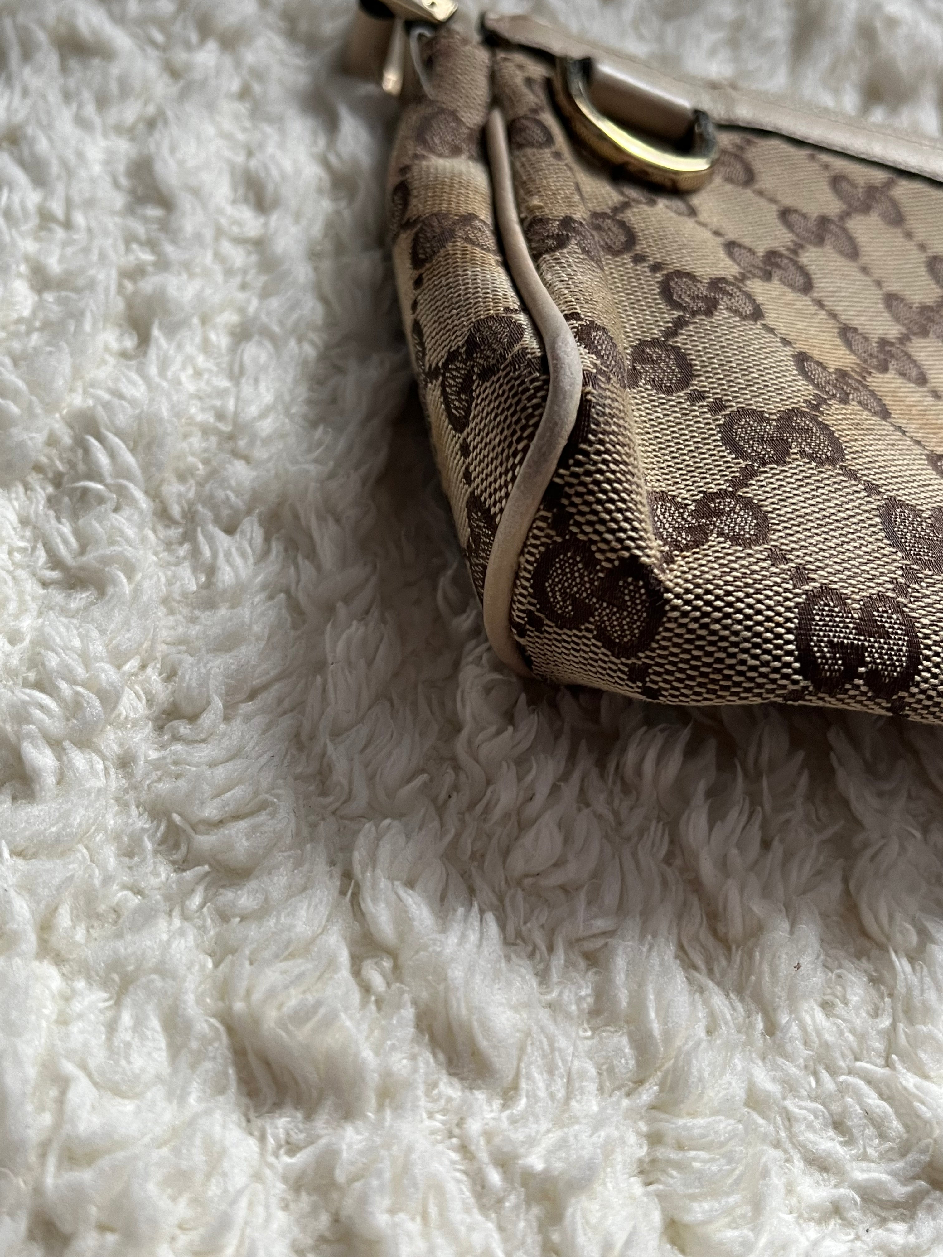 Sac/pochette Gucci en toile GG