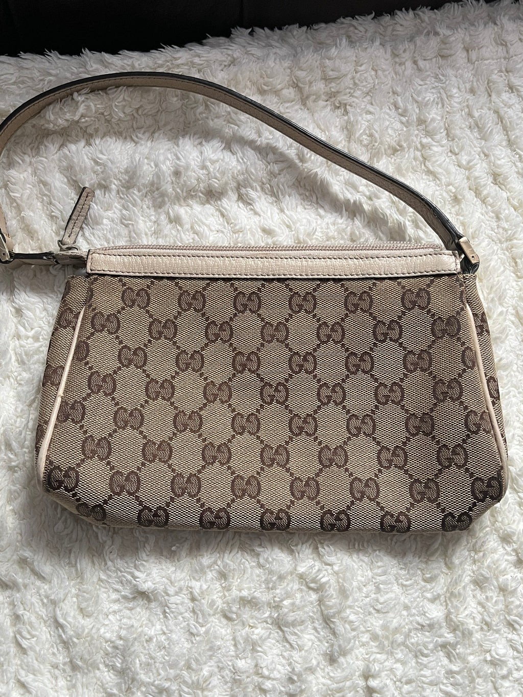 Sac/pochette Gucci en toile GG