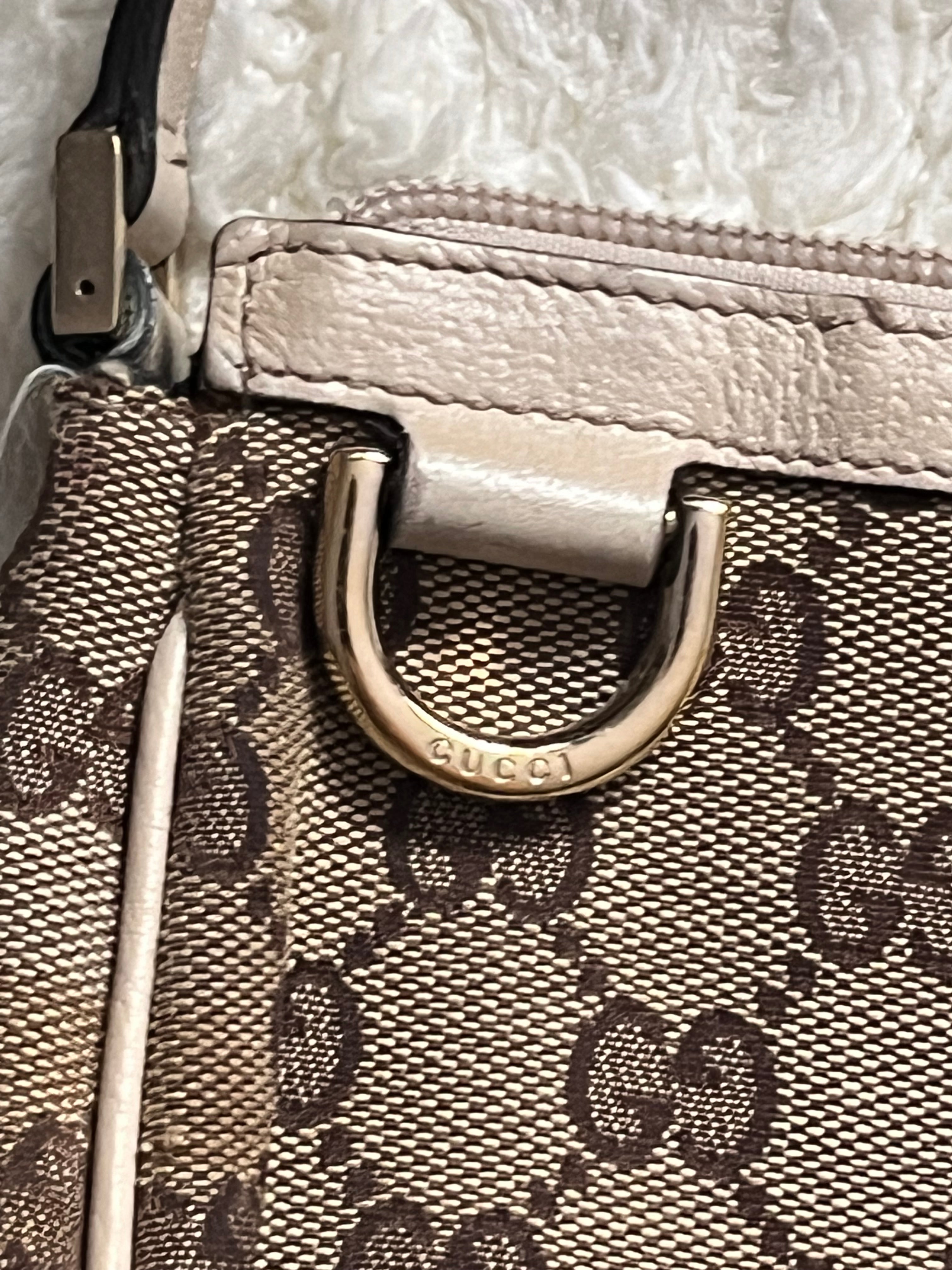Sac/pochette Gucci en toile GG