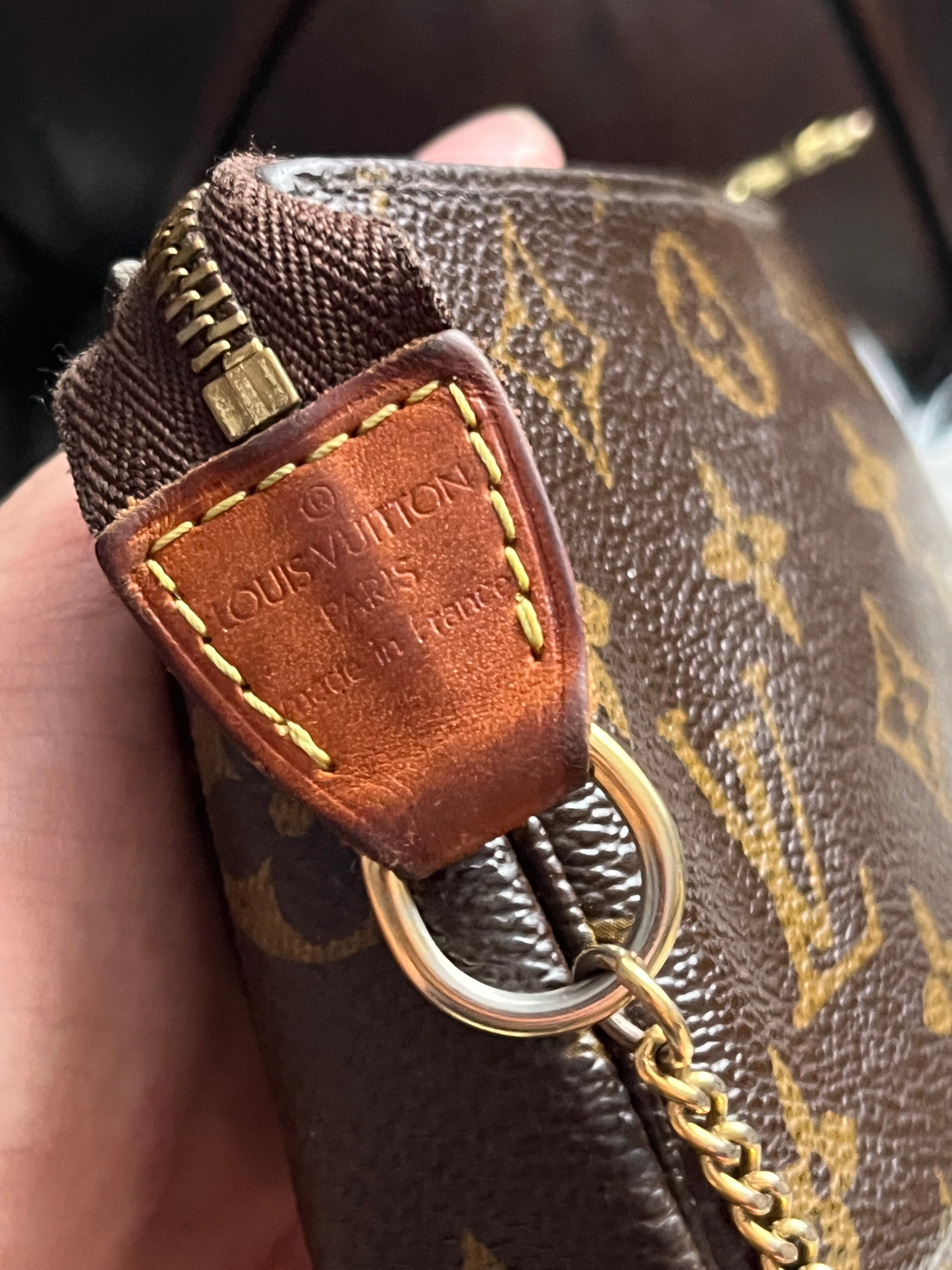 Mini pochette Louis Vuitton en toile monogramme